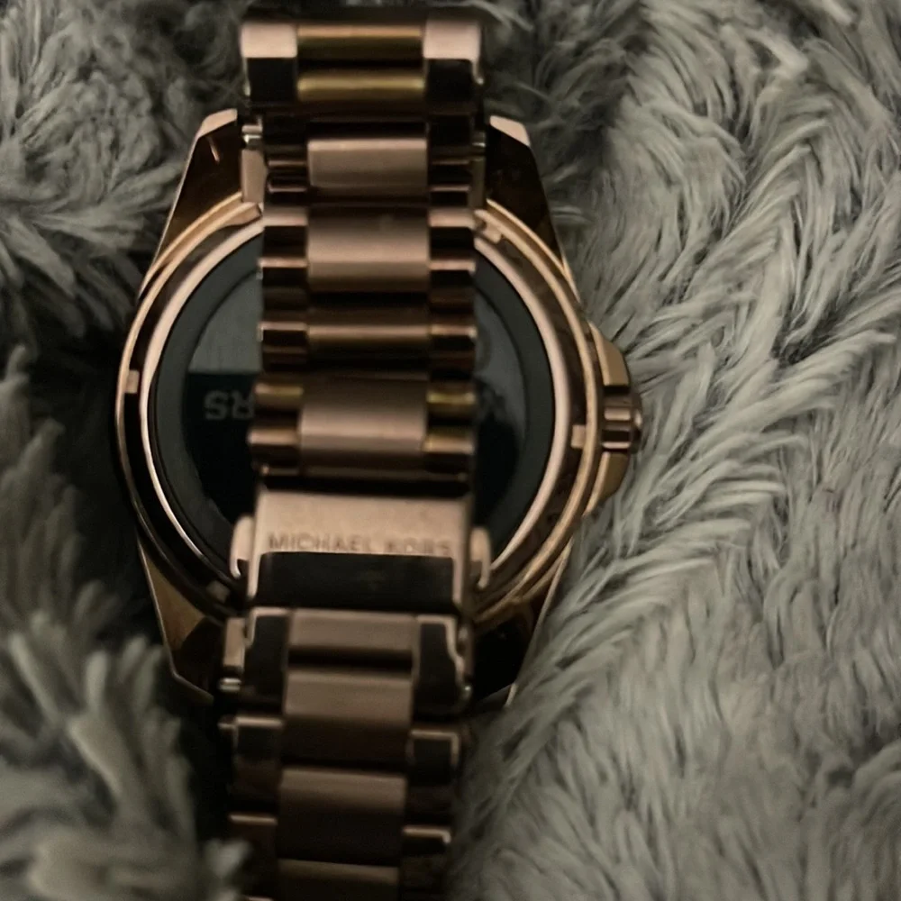 Watches. Samsung/Michael Kors